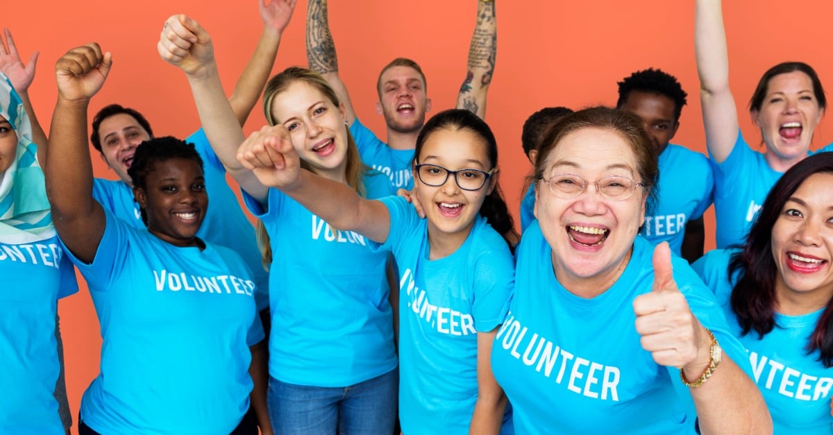 A Group of Non-profit volunteers excited to get help organizing their donations thanks to Selworthy and HubSpot